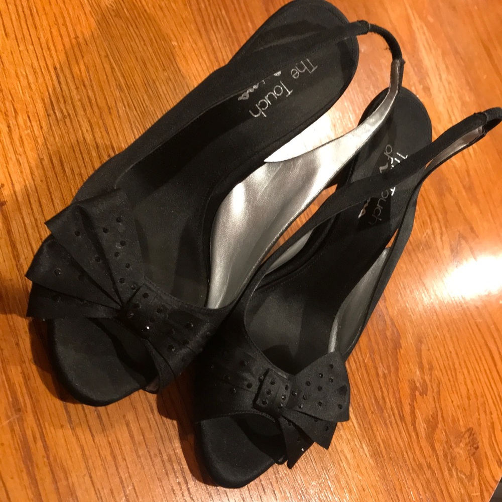 Black sling back pumps w/half bow